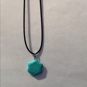 Turquoise flower shaped gemstone